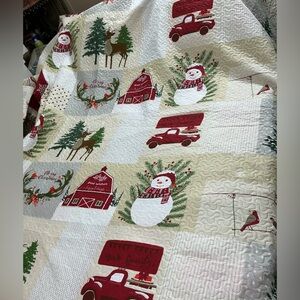 Festive Holiday Quilt with Snowman and Reindeer Design